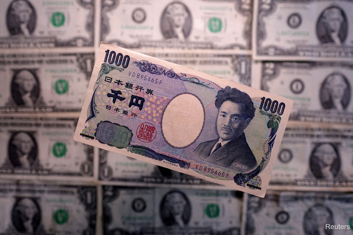 Japan PM vows to act against speculative market moves after yen spike